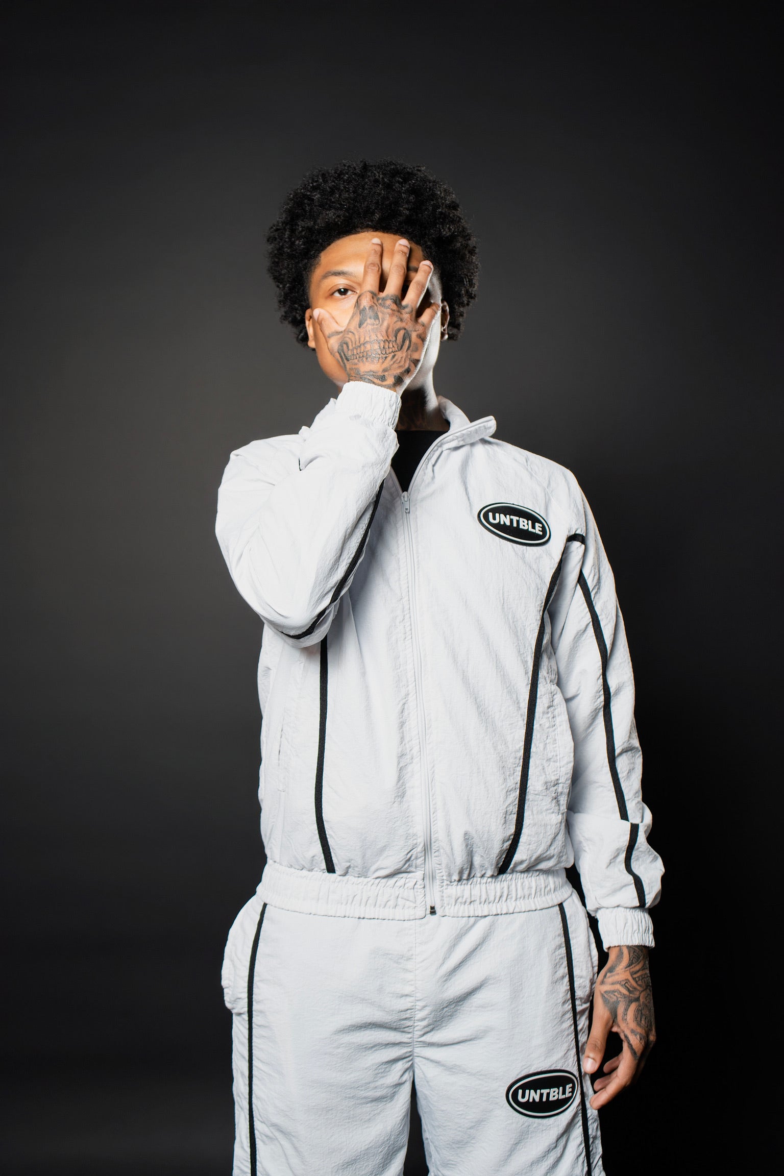WHITE “UNTBLE” TRACKSUIT JACKET